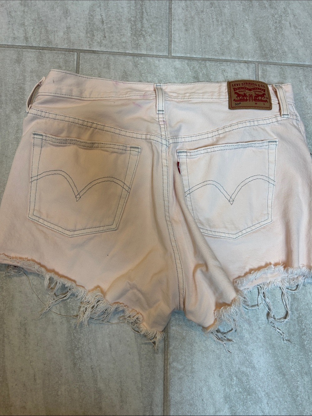 Levi's Light Pink Distressed Denim Cutoff Shorts